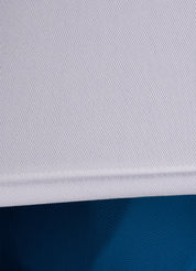 Close-up of ONCOURTANTICS white performance t-shirt fabric, highlighting lightweight, breathable material.